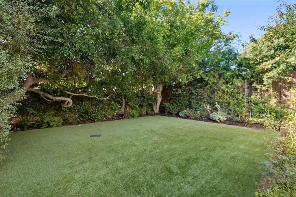 Emma stone spanish style house exterior yard