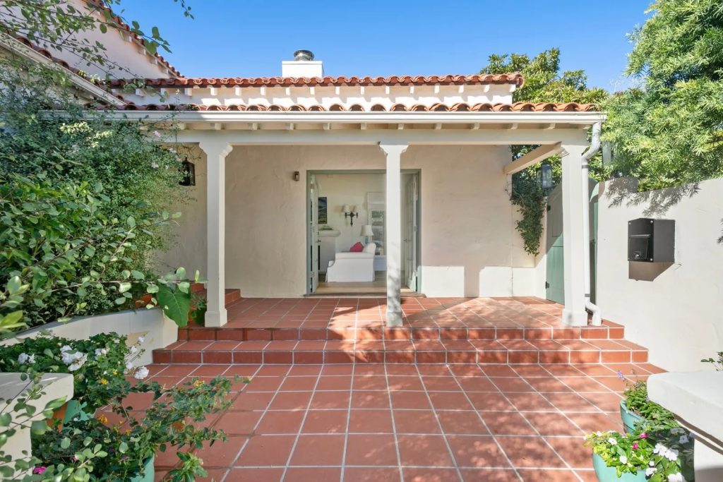 Emma stone spanish style house exterior courtyard